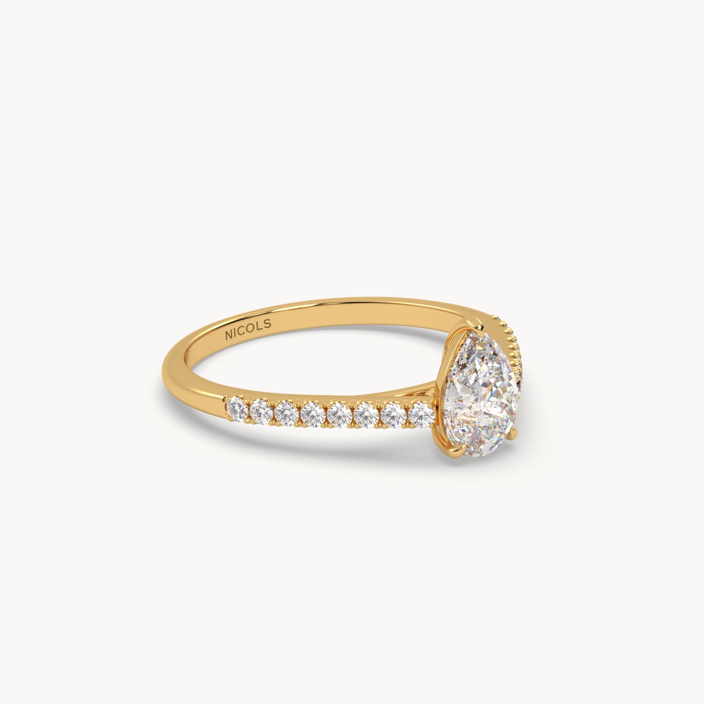 18k yellow gold  petite pavé cathedral engagement ring for 0.70ct pear diamond cut